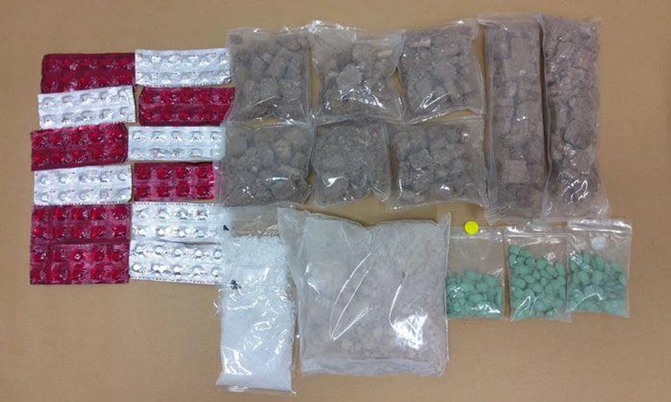 Some of the controlled drugs seized from two Singaporean males aged 45 and 51, who were arrested in the vicinity of Sims Avenue in a CNB operation on 25 and 26 September 2021. PHOTO: CNB