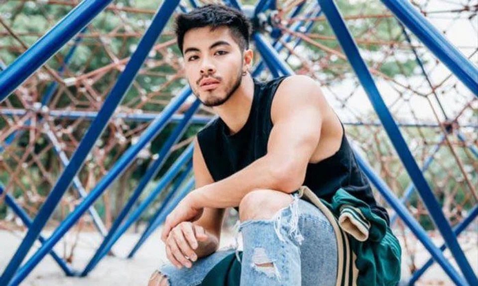 Benjamin Kheng apologises for magazine pose suggesting that he's aiming gun at himself