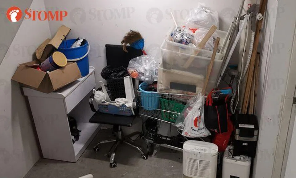 Town council removes bulky items cluttered at staircase landing of Hougang Meadow block