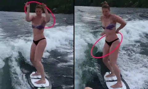 Bikini babe surfs while doing hula hoops -- and makes it look so easy
