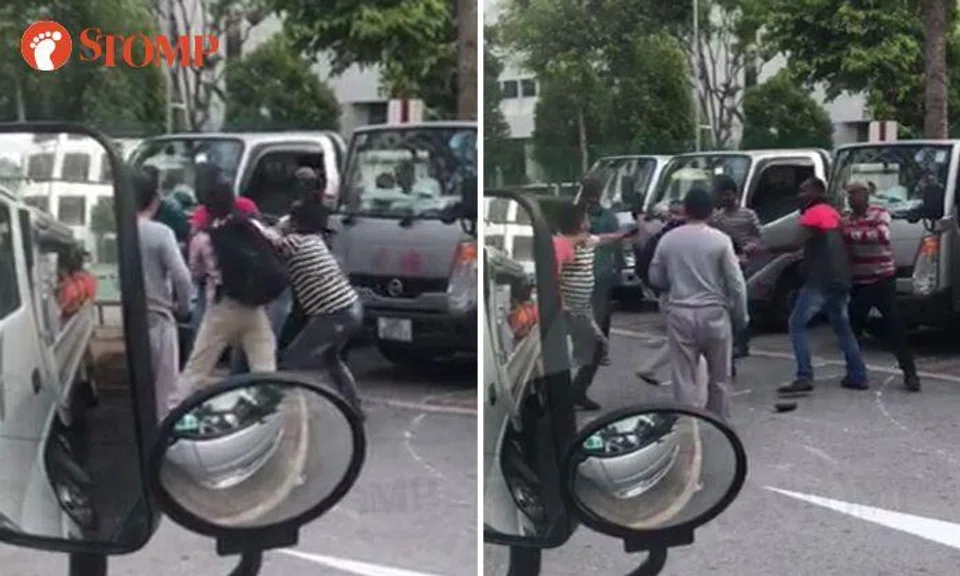 Men exchange blows outside Mandai dormitory