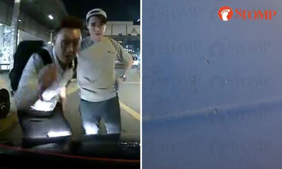 Man hits car bonnet and challenges Grab driver to a fight after blocking traffic in Clarke Quay