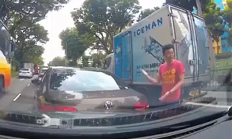 Volkswagen driver makes hand gestures at motorist -- when he's the one who rolled back into car