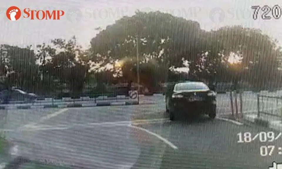 Car makes illegal right turn near NUH despite Stomper's warning honk