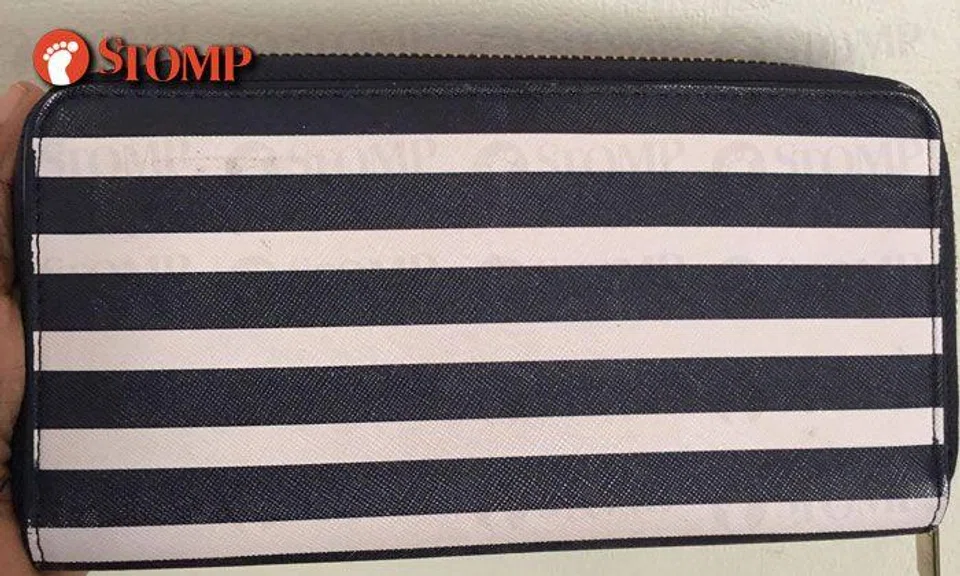 Kind woman is searching for owner of purse who left it at Geylang Serai