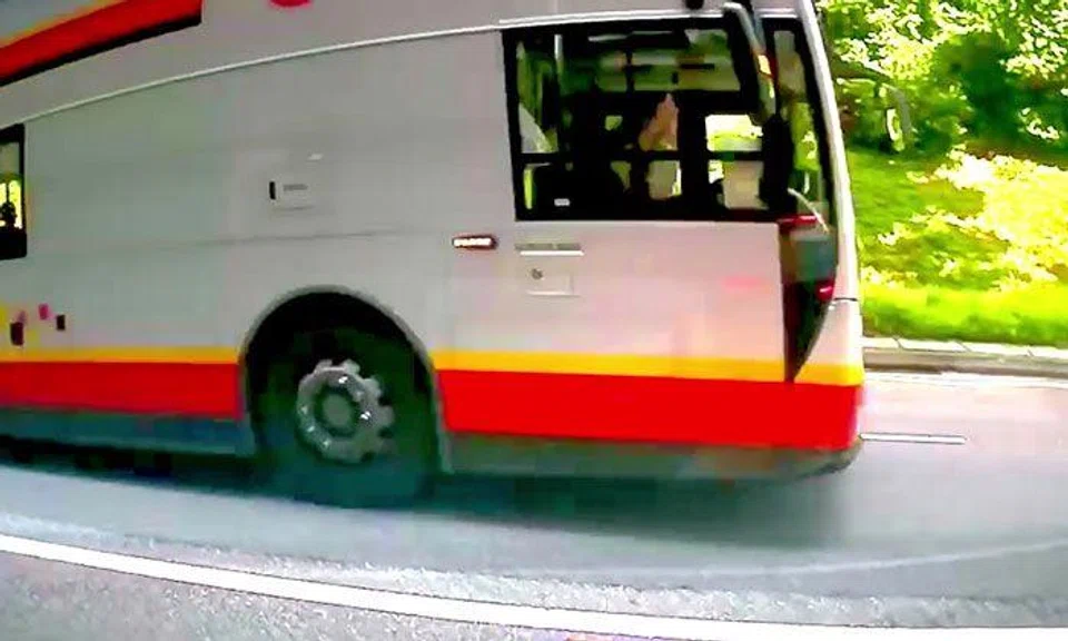 Bus captain was closing window, not flashing "middle finger" at motorist, SMRT clarifies