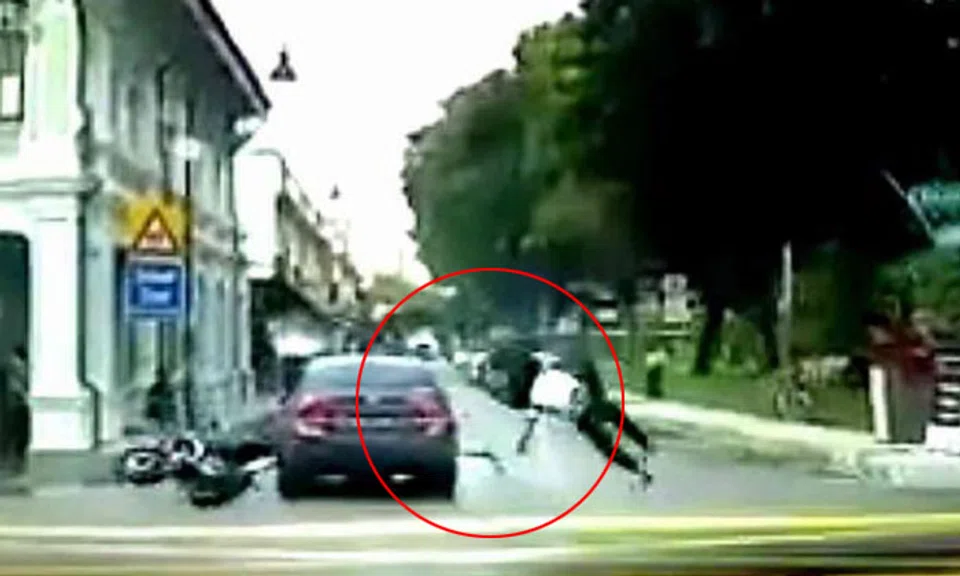 Delivery rider unhurt after flying over roof of car during accident at ...