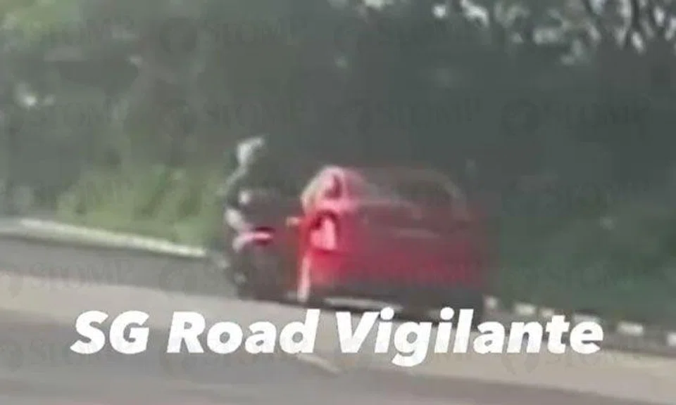 Mazda tries to run motorcycle off road and forces rider to stop at bus stop along Thomson Road