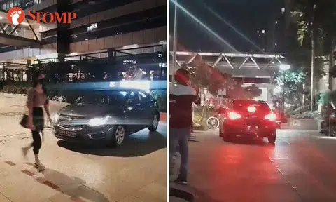 Chevrolet shocks pedestrians by travelling on walkway outside Paya Lebar Quarter