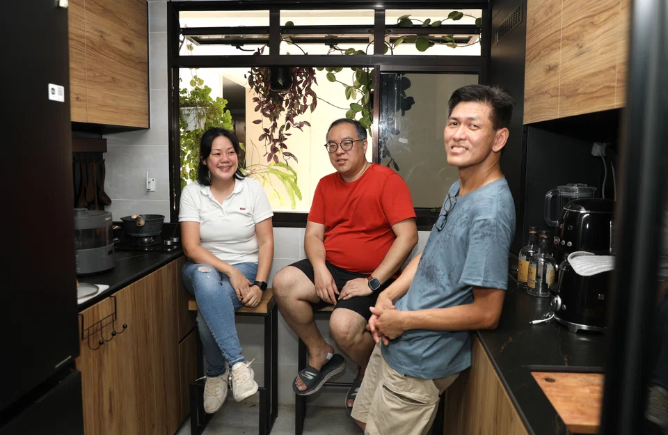 Mr Thomson Lim (right) and his Tengah buddies are among an estimated tens of thousands of Singaporeans who are members of resident-run Telegram groups for BTO estates here.