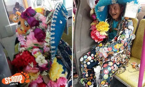 I badge-ew can't count how many items there are on this happy SBS bus commuter