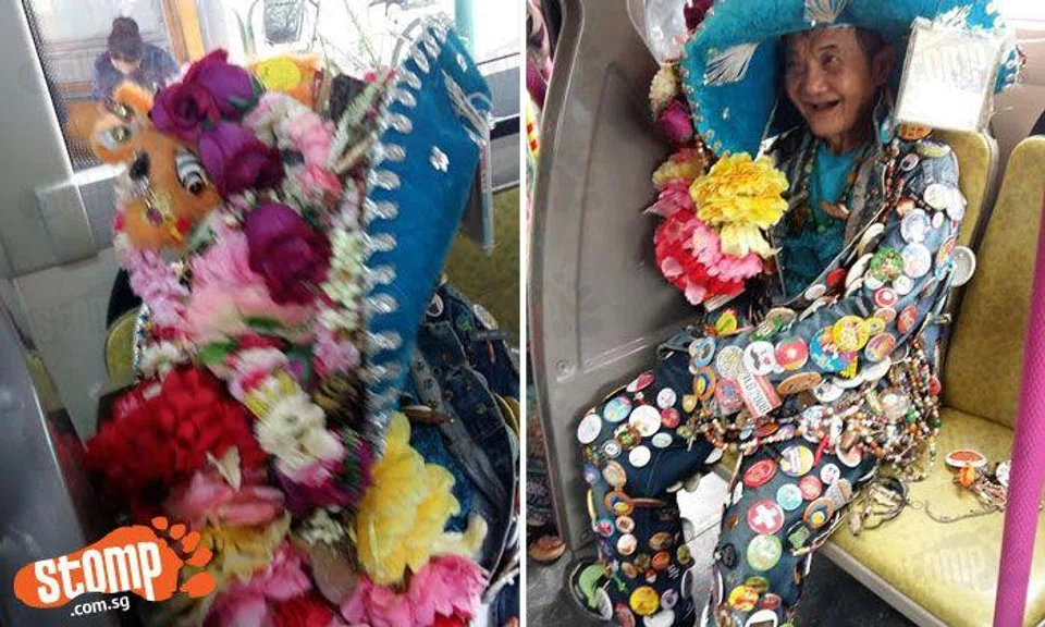 I badge-ew can't count how many items there are on this happy SBS bus commuter