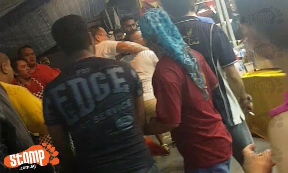 Men brawl at Geylang Bazaar and one guy even has to be restrained