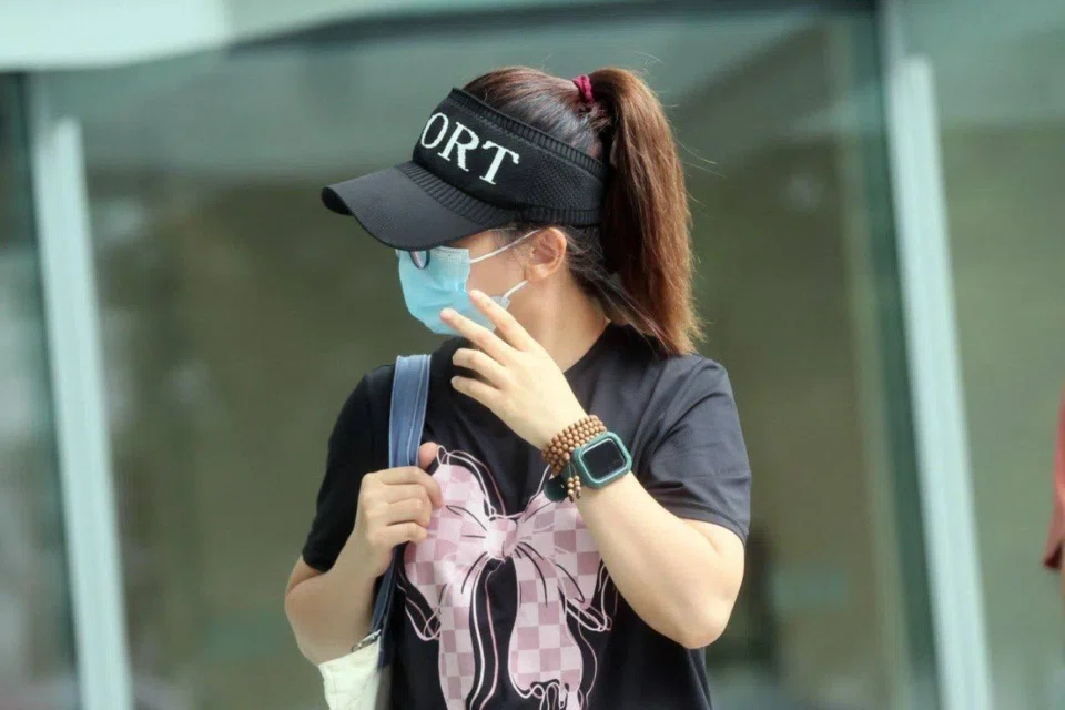 Former pre-school teacher Lin Min arriving at the State Courts on Feb 28, 2024. She pleaded guilty on March 5 to three counts of ill-treating a child.