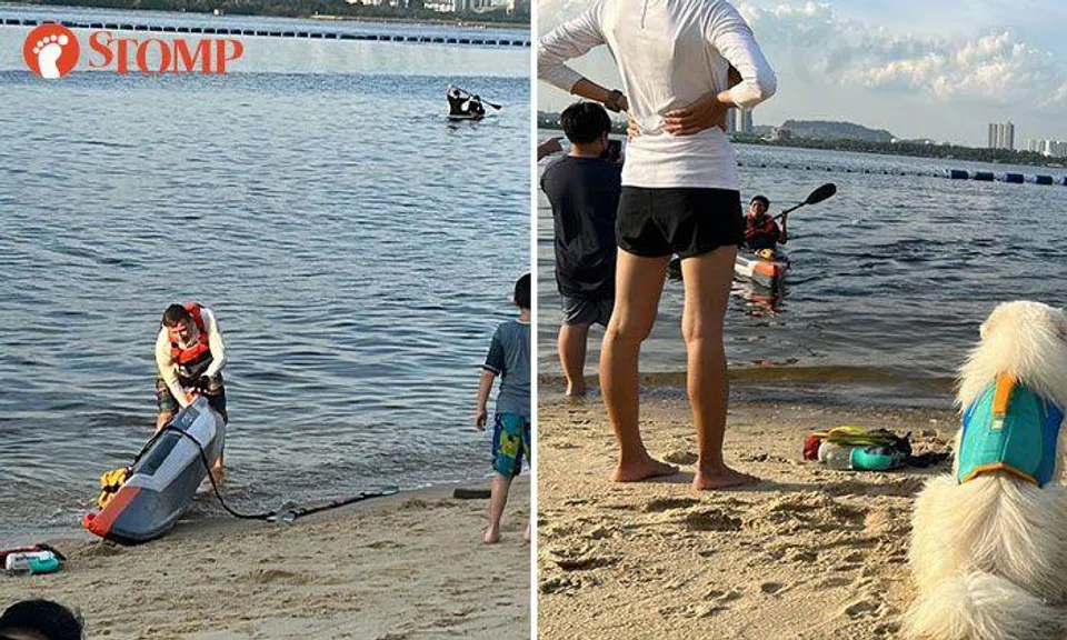 Couple graciously offer to teach teenagers how to kayak at Sembawang Beach