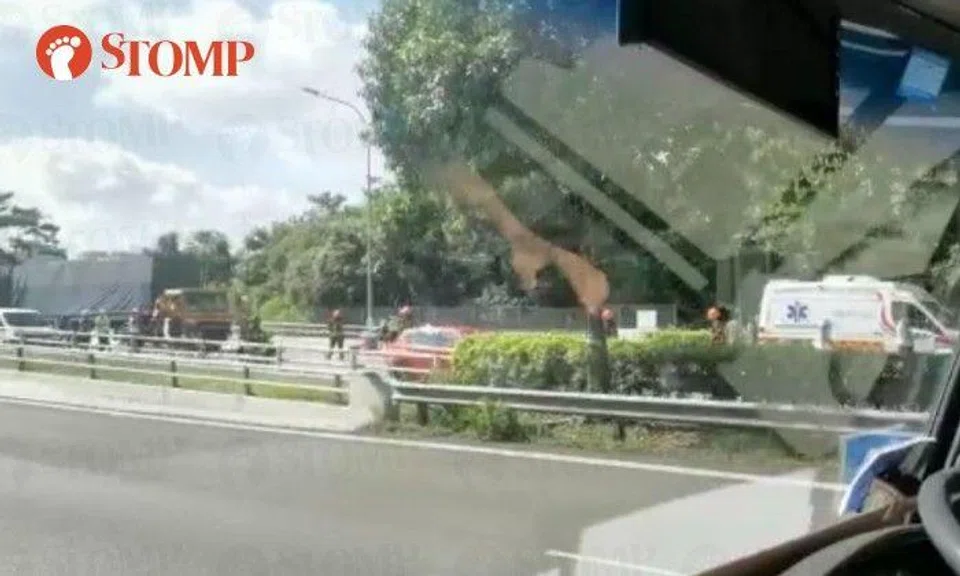 Man trapped in driver's seat after accident involving truck and trailer at KJE