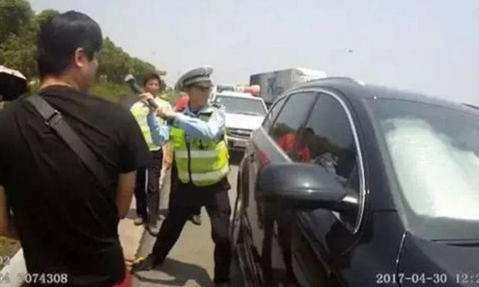 Chinese grandma, baby rescued from sweltering locked car after family row