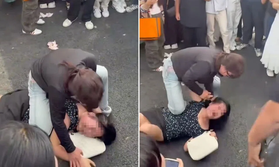 Woman pinned, slapped, China, affair allegations