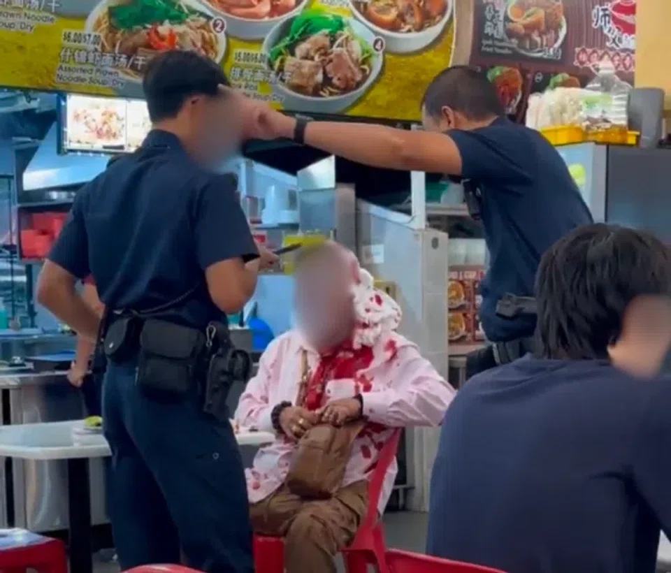 The man was covered in blood.