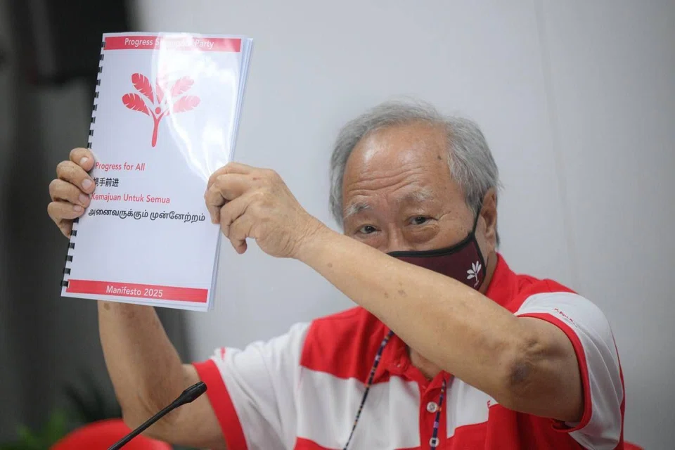 PSP chairman Tan Cheng Bock presenting the party’s manifesto and campaign slogan at the PSP headquarters on April 6.