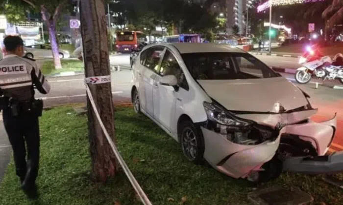 4 injured after car crashes into taxi and lamppost outside Hougang ...