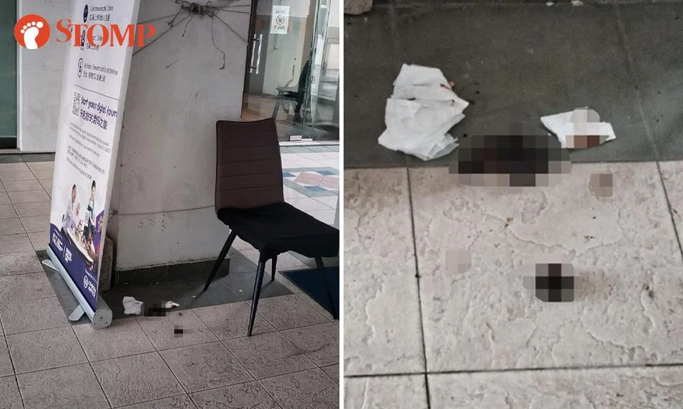 human poo in front of hougang community club