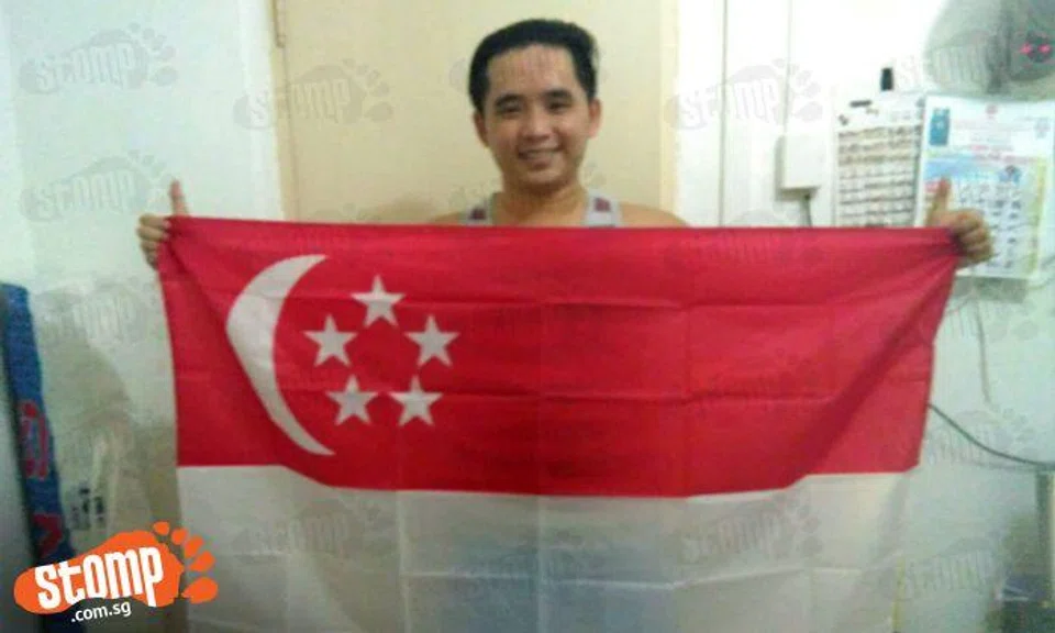I might be 'Johorean' -- but I'm so proud to hold this great flag and celebrate National Day!