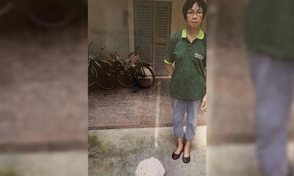 Cleaner Phang Aik Kam was hit by a plastic bag full of rubbish when she was just starting her shift at Block 10D Braddell View. TNP PHOTOS: HIDAYAH ISKANDAR, CHEOW SUE-ANN