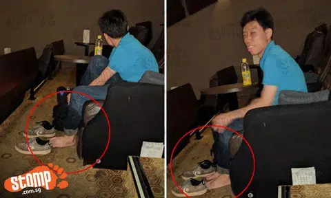 Eh bro, please put on your shoes and socks -- this is a cinema, not your house