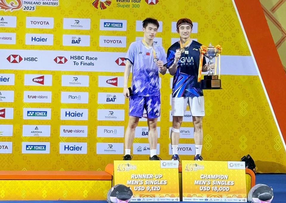 Singapore's Jason Teh celebrates after winning his first international title by beating China's Wang Zhengxing in the Thailand Masters men's singles final on Feb 2.