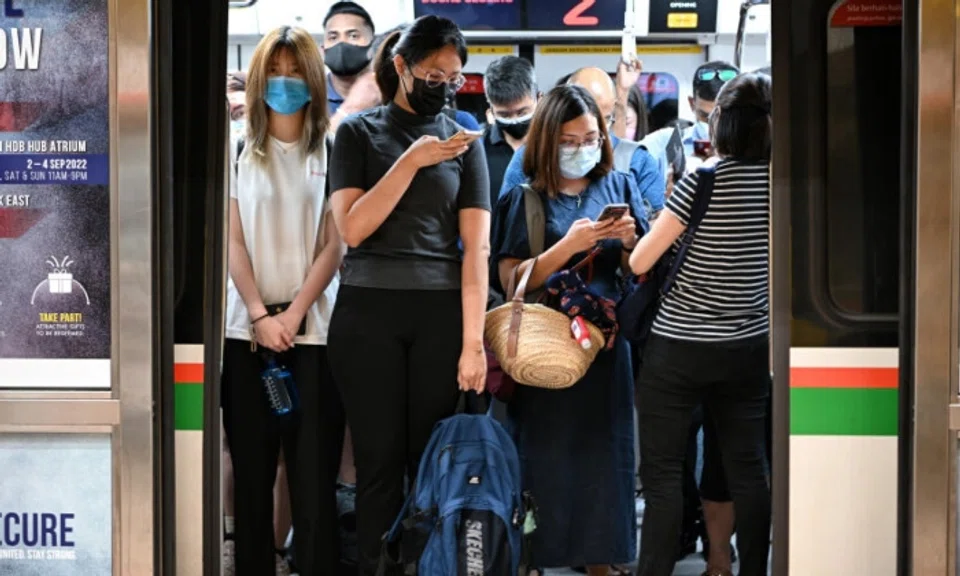 Singapore will lift its remaining Covid-19 restrictions like requiring masks on public transport from Monday, when the country adjusts its disease outbreak response to the lowest level. Photo: The Straits Times