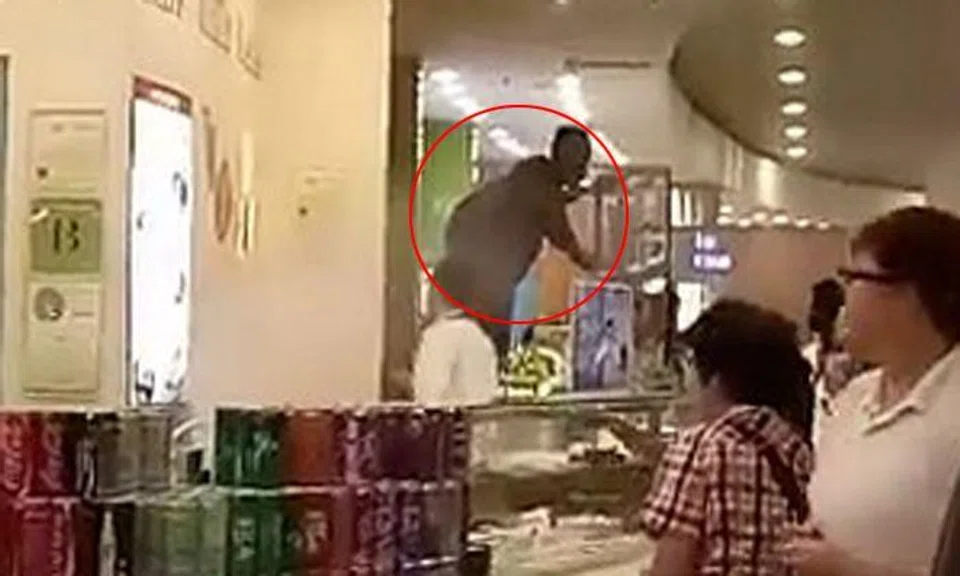 Diner brings stall assistants to safety after fire breaks out at Jurong Point chicken rice stall