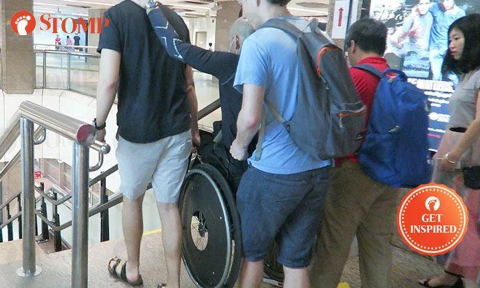 Passers-by unite to carry wheelchair-bound uncle down stairs at Tanjong Pagar MRT Station