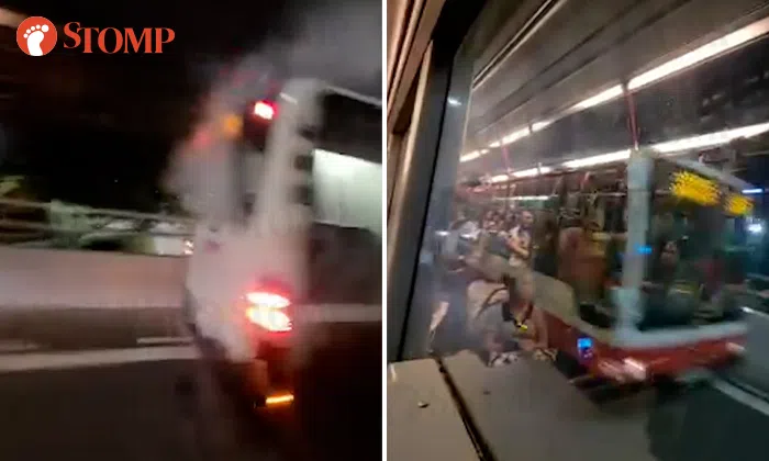 Smoke seen billowing from SMRT bus on PIE after its engine catches fire ...