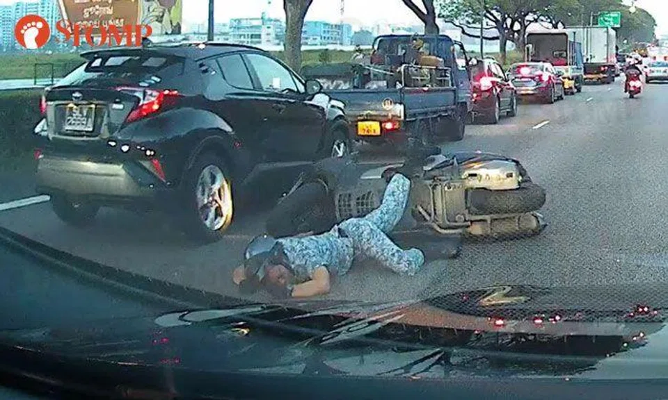 Motorcyclist sent flying after getting hit by van along PIE 