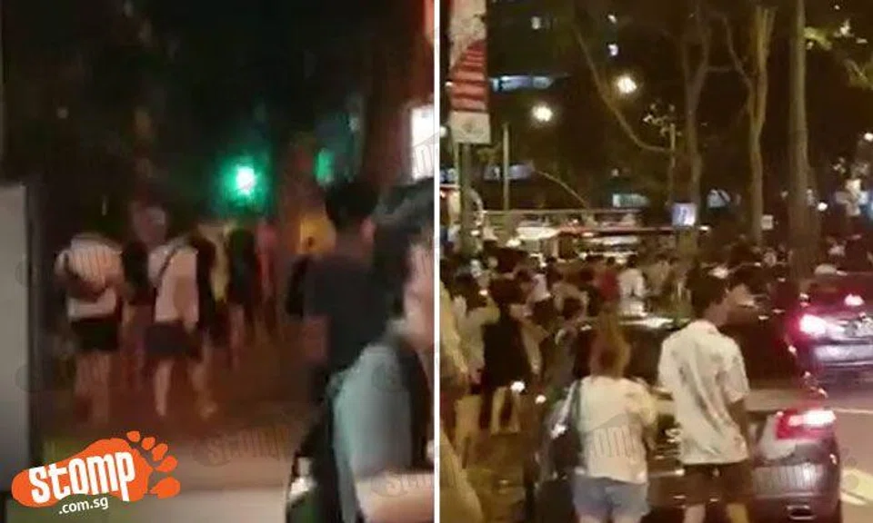 Seriously guys, the game is not worth your life! 'Crazy' crowd near Block 401 in Hougang rushes across road to catch Pokemon