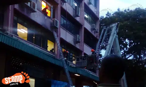 Aircon technician falls from 5th floor of Yi Xiu Building at Sims Avenue