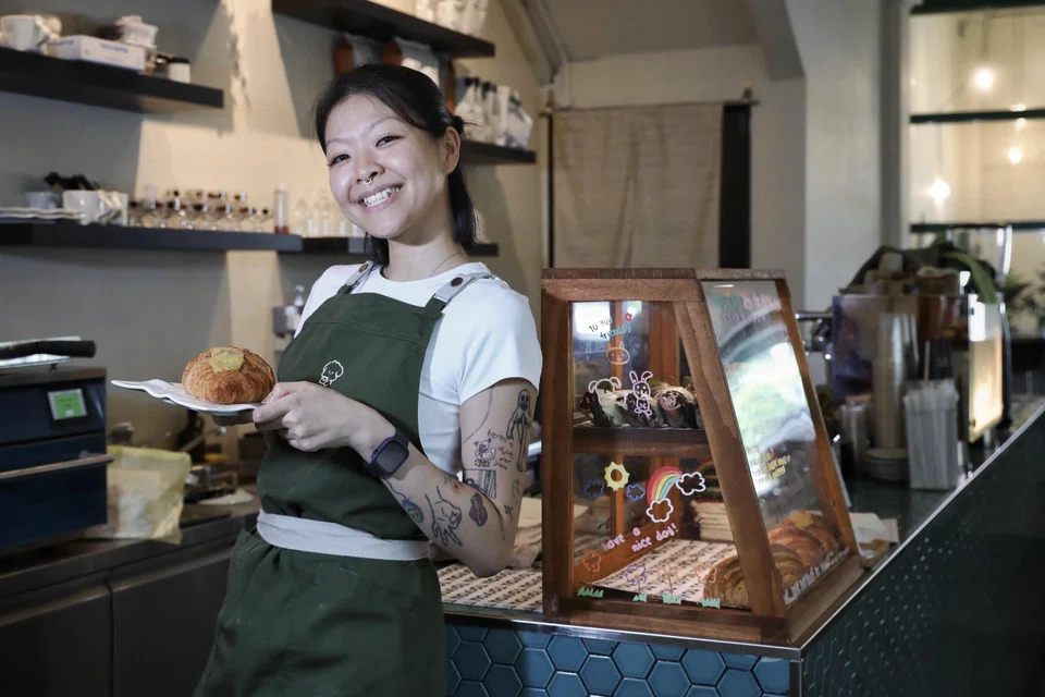 To:You co-owner Laura Lau with the store's display of bakes. 