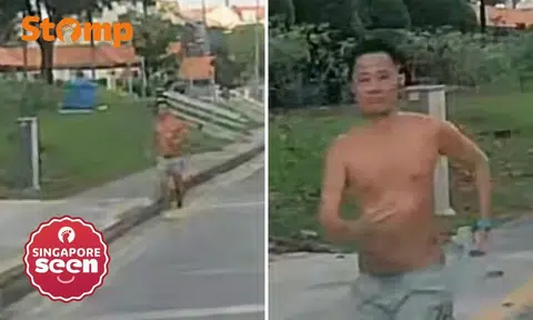 Topless jogger runs on road instead of pavement, allegedly flashes middle finger at driver