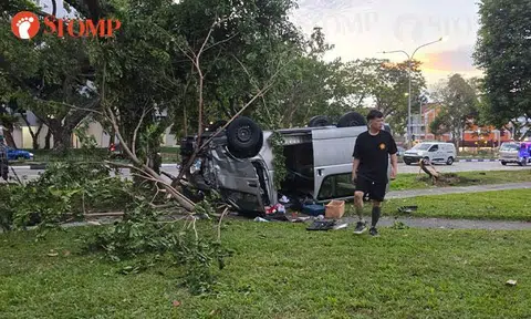 Van overturns in Hougang accident: Stomper cuts driver free before he's arrested for careless driving