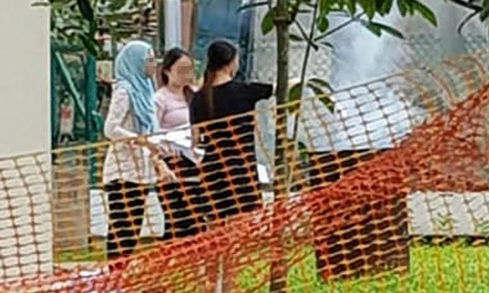 The three women were spotted burning documents in an offering bin. 