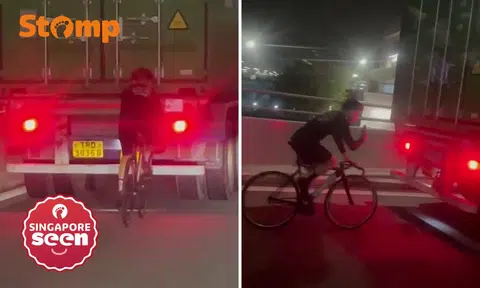 Yet another youth tails heavy vehicle while cycling -- this time one-handed on West Coast Highway