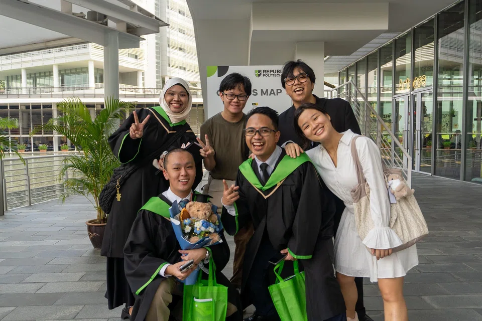 Mr Muhammad Haikal (second row, middle) and his friends during his Republic Polytechnic graduation ceremony.