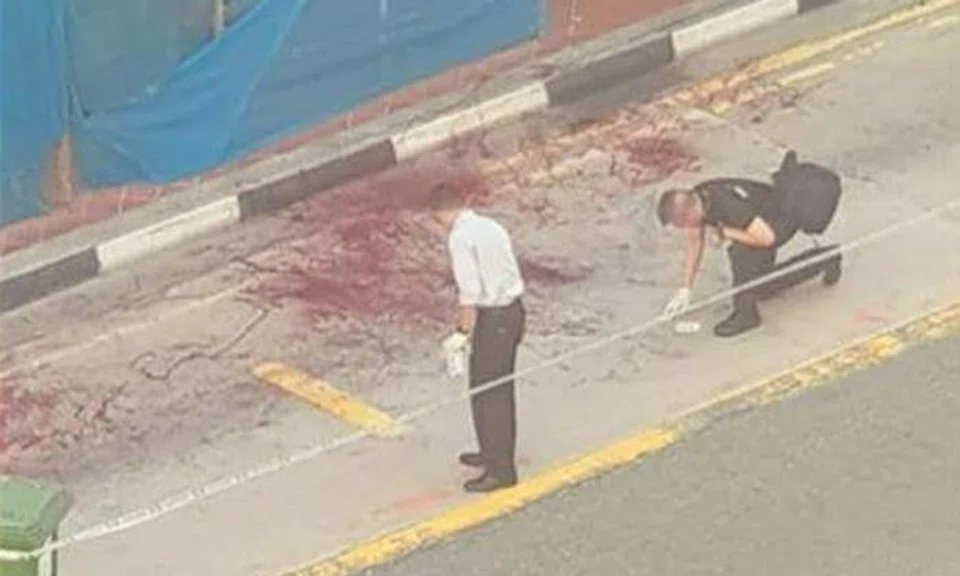 Man taken to hospital after fight that left ground bloodied at South Bridge Road