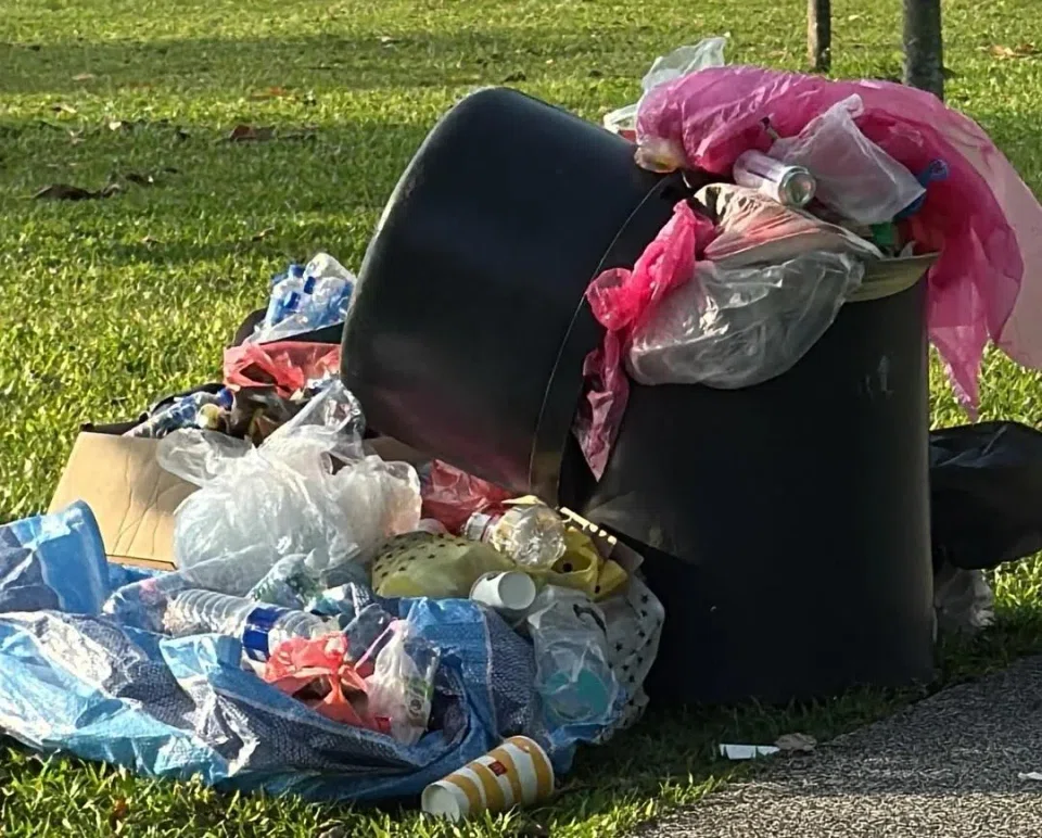 Rubbish seen overflowing from bins and scattered across picnic areas at East Coast Park during the Vesak Day public holiday.