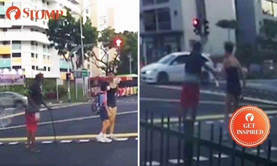 Kind lady stops to help man walking with limp cross Upper Serangoon Road junction