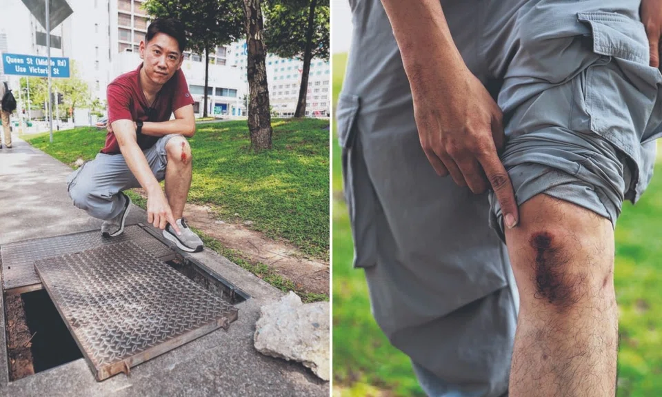 man falls after drain cover collapses bugis footpath