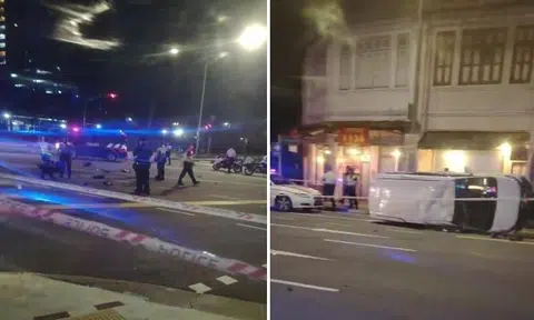 Motorcyclist rides through police road block and runs red light, dies after accident with car in Geylang