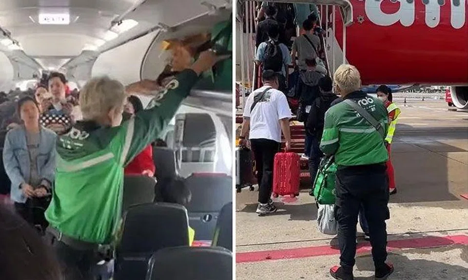 A man dressed in Grab's green uniform was seen boarding a plane from Bangkok to Singapore, in a video that the ride-hailing company has claimed is fictional. PHOTOS: SCREENGRAB FROM THITA.VY/TIKTOK