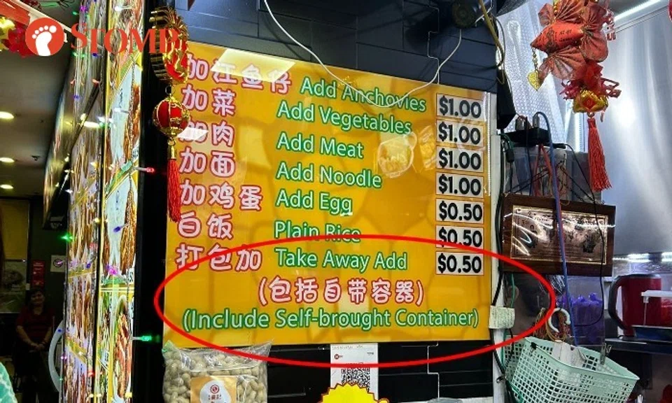 Stomper KT shared a photo of a sign at the stall informing customers that they have to pay an additional 50 cents for takeaway and this includes customers with "self-brought container".
